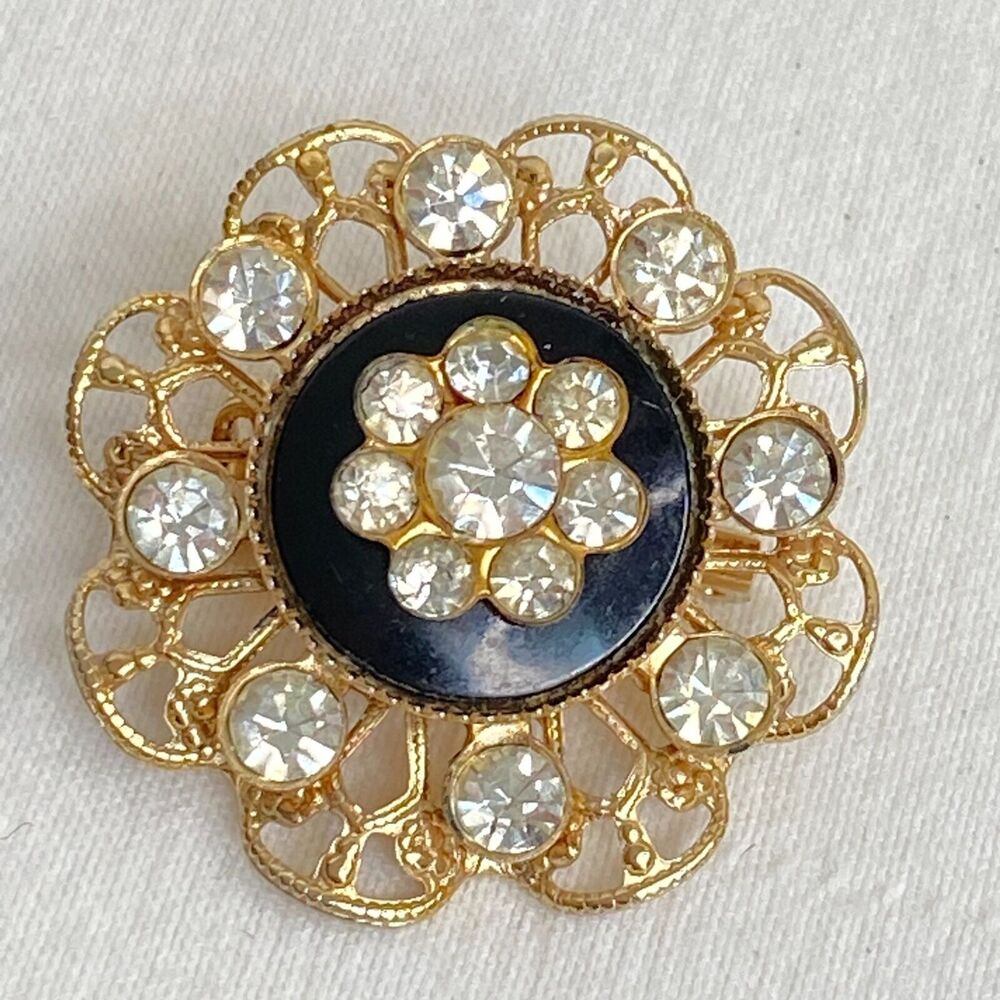 Flower Brooch Clear Rhinestones On Black Stone In Gold Tone Filigree Setting